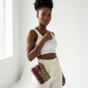 Coach Brown Signature Canvas Wristlet with Plum Stripe